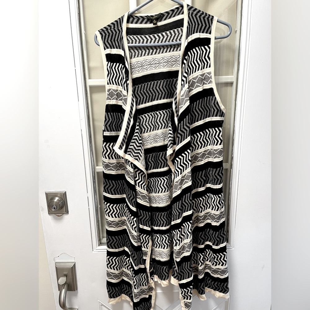 Sweater vest, black and white, open front no buttons or snaps